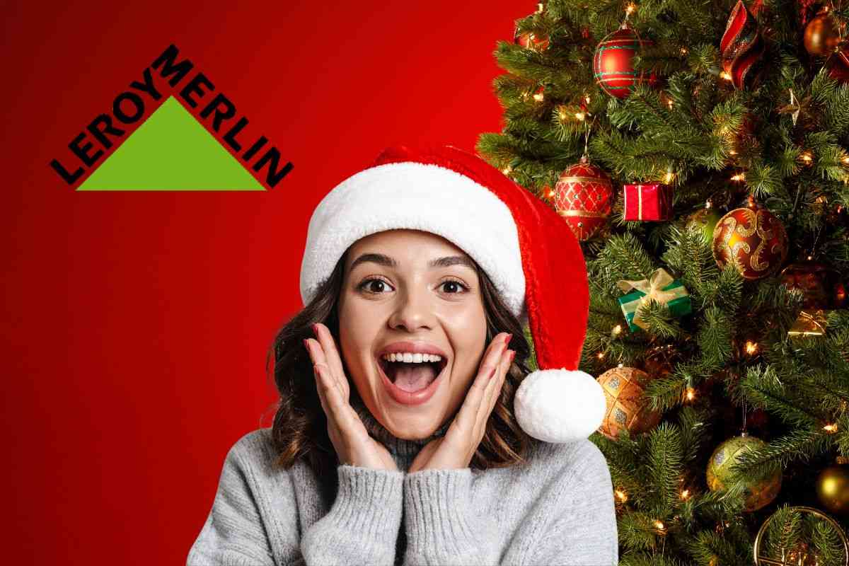 logo leroy merlini donna stupita e albero di natale